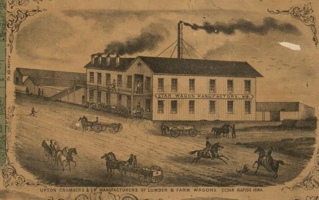 An engraving of a factory with a smokestack, wagons and horses in the yard